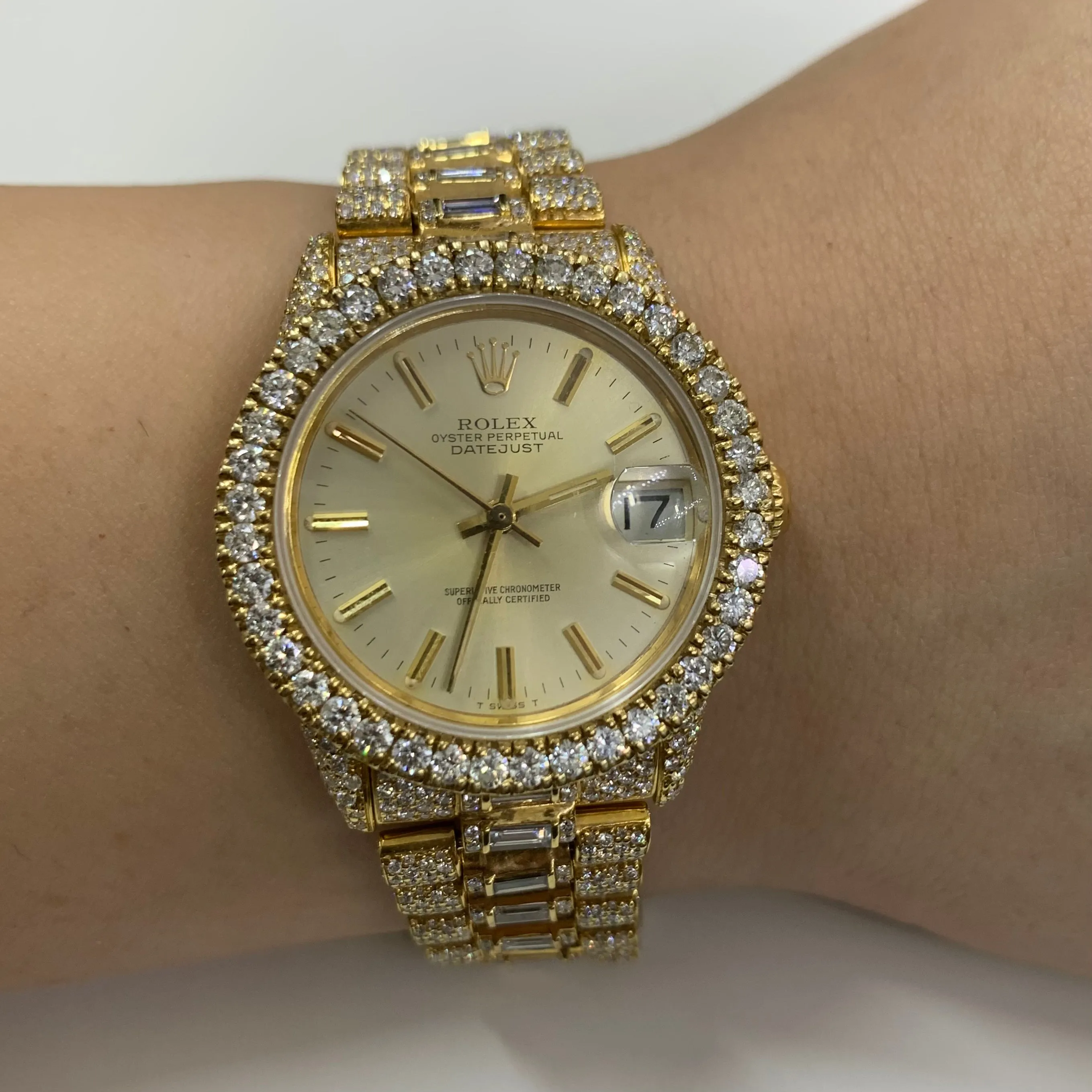 Iced out 31mm Rolex Presidential Watch with Baguettes and Round Diamonds
